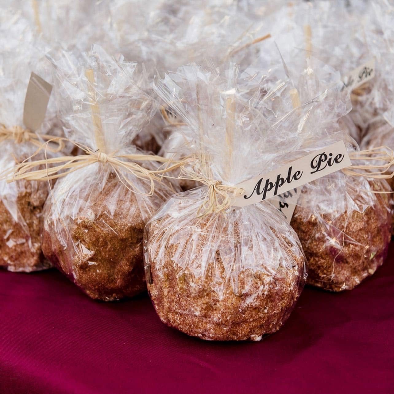 Apple Pie candy apples wrapped in cellophane, tied with raffia and labeled Apple Pie